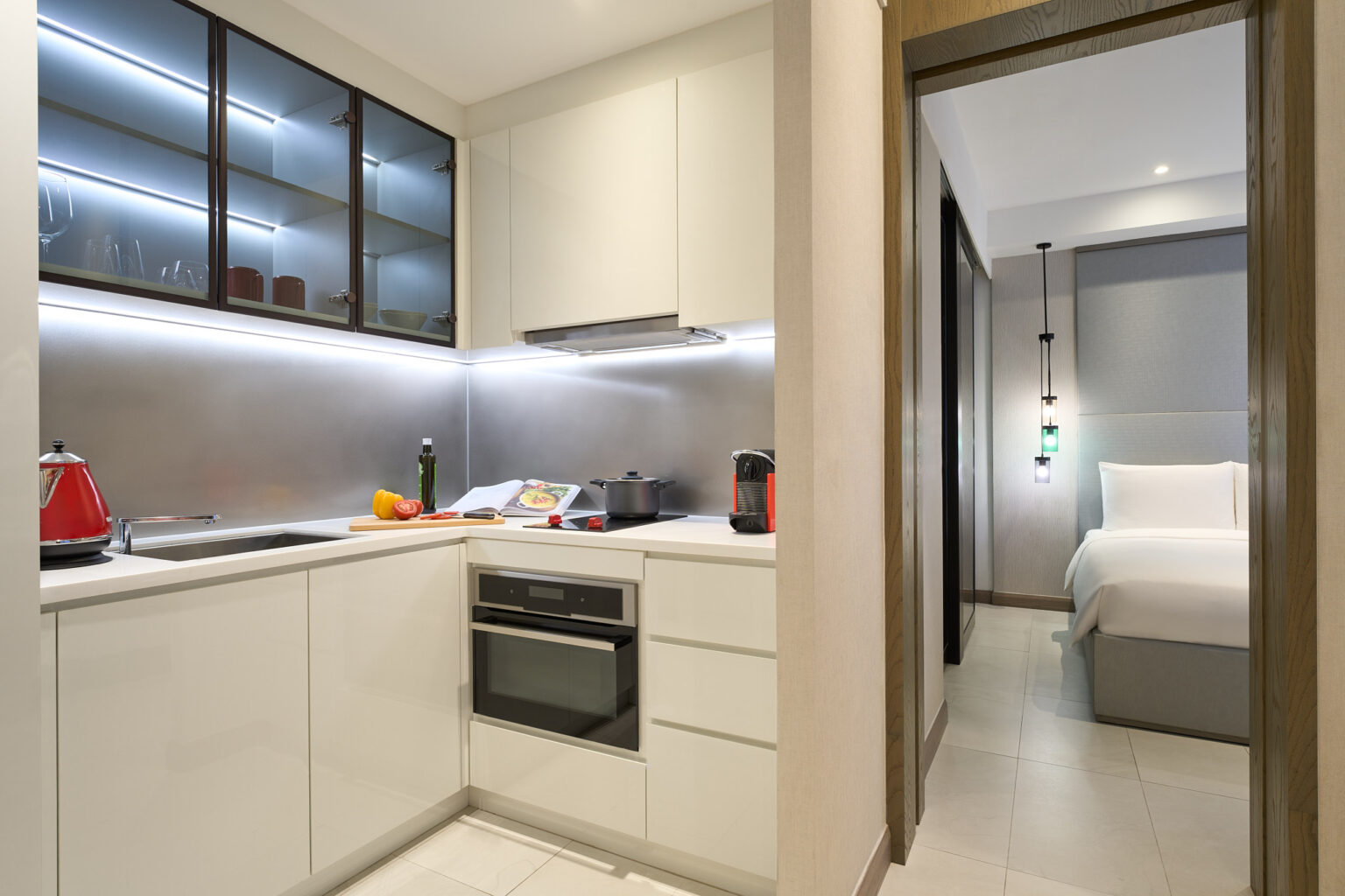 sr sg oakwood studios singapore one bedroom deluxe kitchenette lr