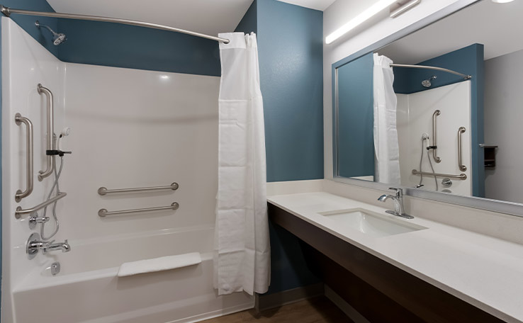 woodspring suites chandlerapt extended stay hotel ada bathroom 738x456