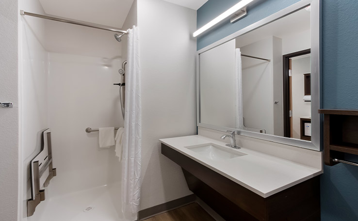 woodspring suites chandlerapt extended stay hotel ada bathroom transfer shower 738x456