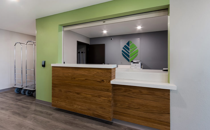 woodspring suites chandlerapt extended stay hotel lobby front desk 738x456