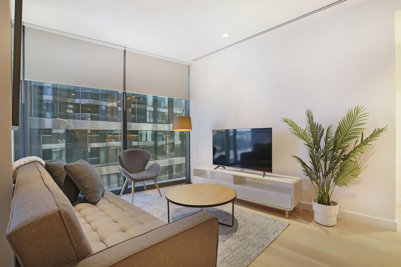 melbourne collins arch 1 bed corporate apartment lounge