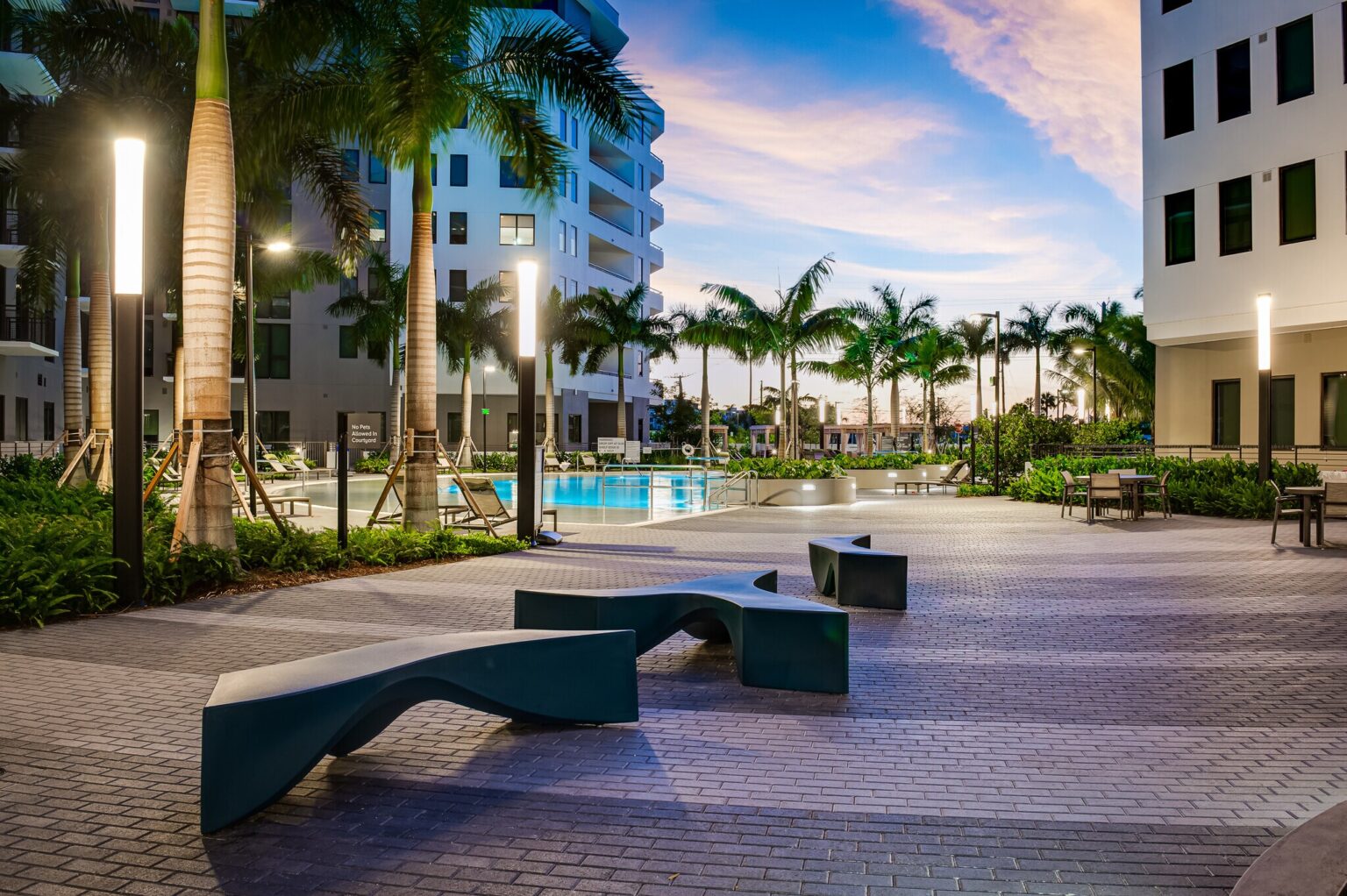 avalon doral doral fl pool courtyard and walkway at dusk